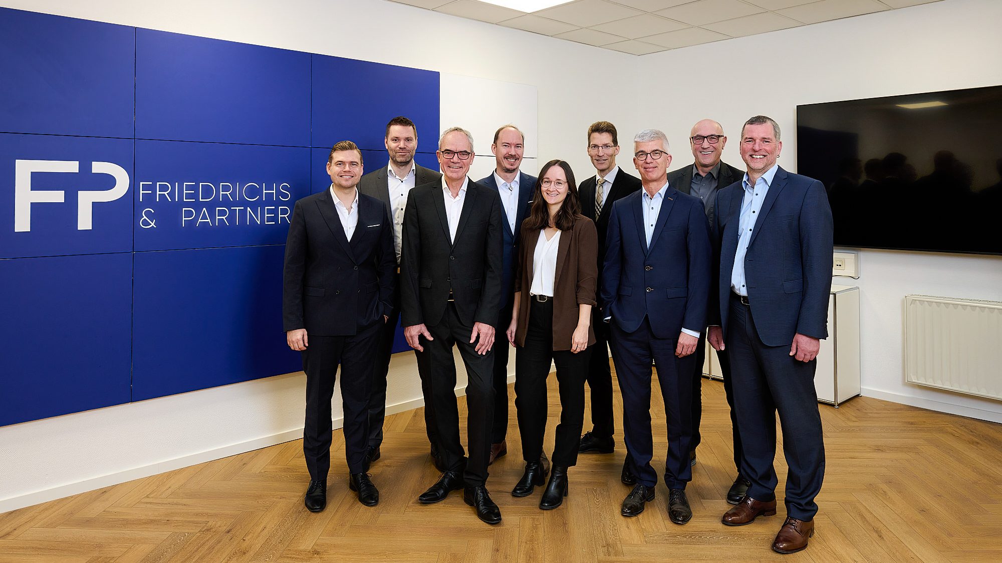 Gruppenbild der Partner, Steuerberater und Wirtschaftsprüfer von Kanne & Partner sowie Friedrichs & Partner